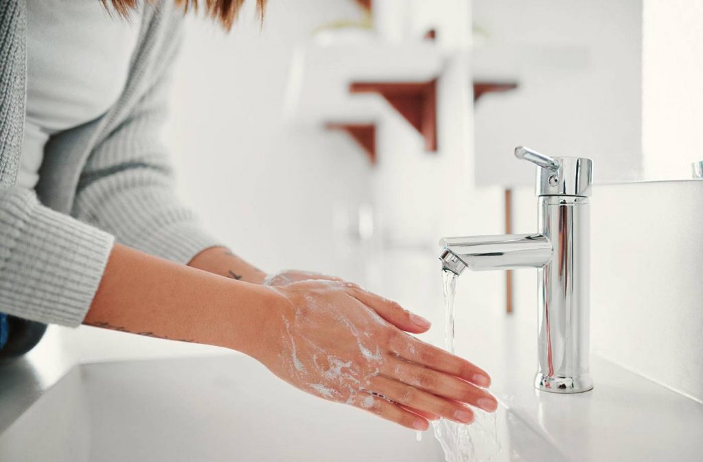 woman washing hands